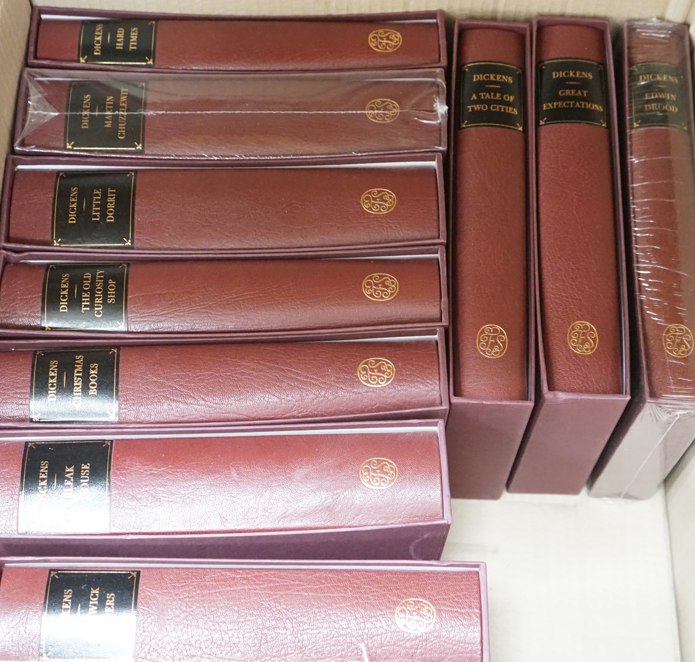 A collection of Charles Dickens folio society books including Bleak House, Great Expectations and Dicken’s London